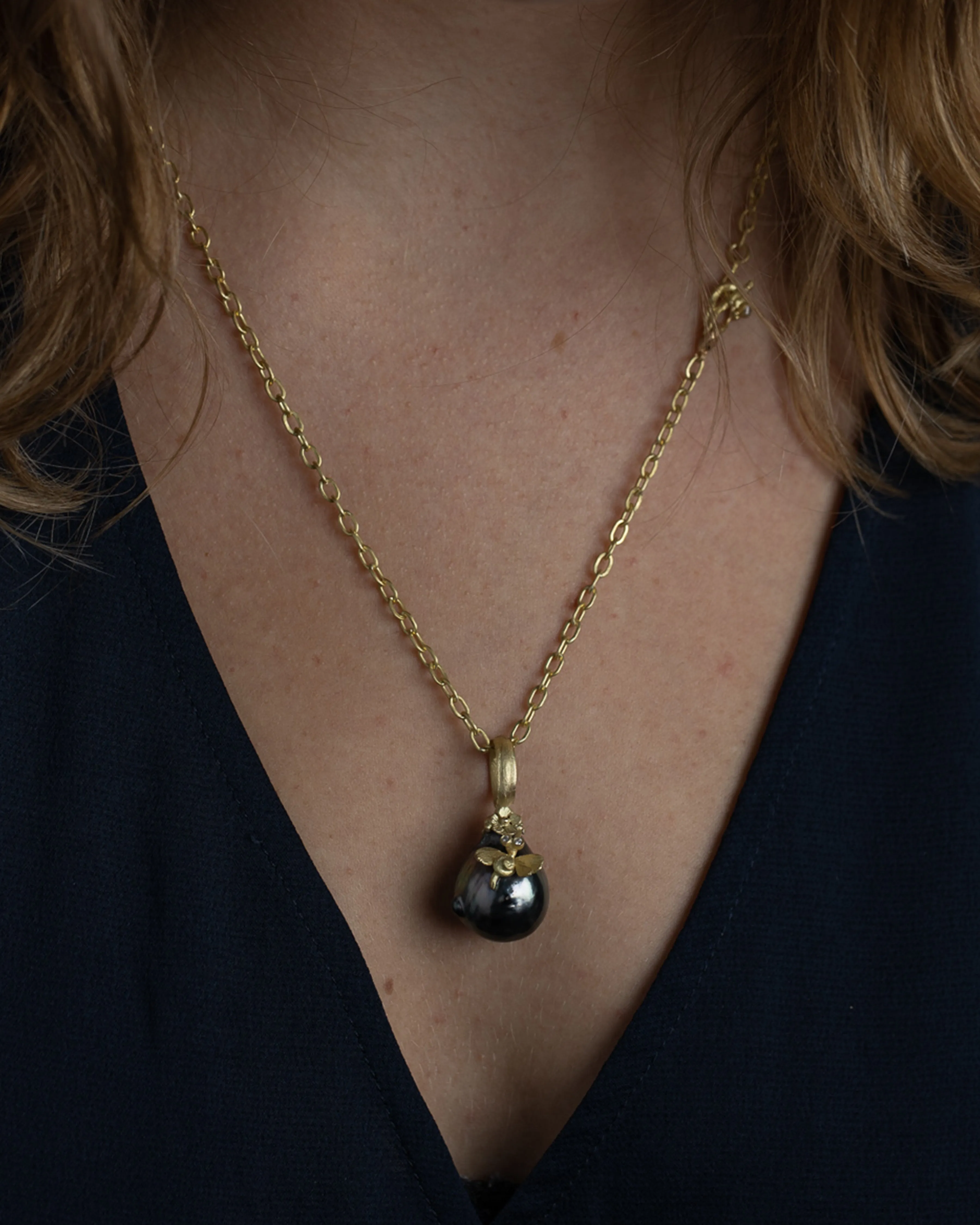 cultured large tahiti pearl with dragonfly and diamonds