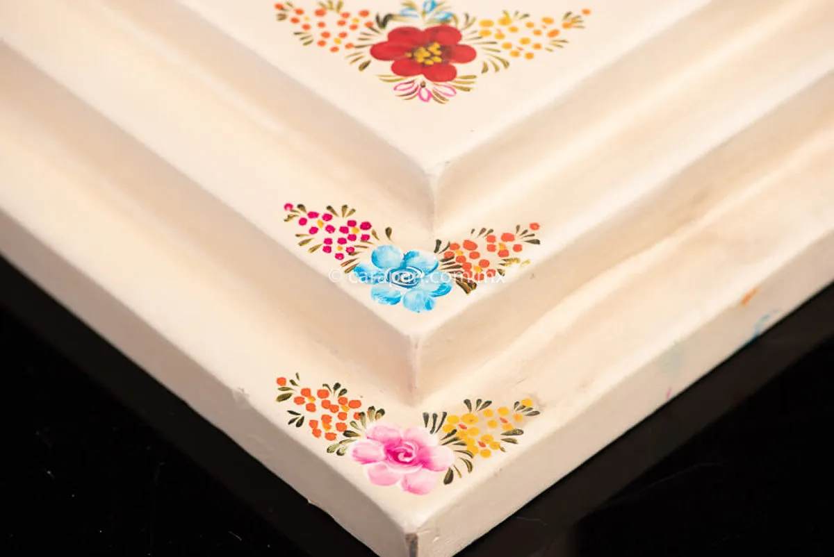 Mexican Lacquered Cross in beige with flowers.