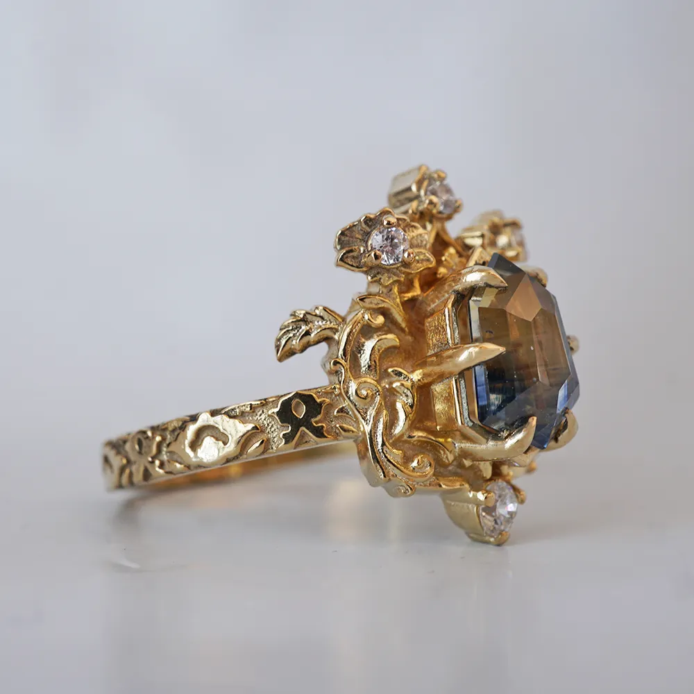One Of A Kind: Bi Color Sapphire Shield Paradise Ring in 14K and 18K Gold