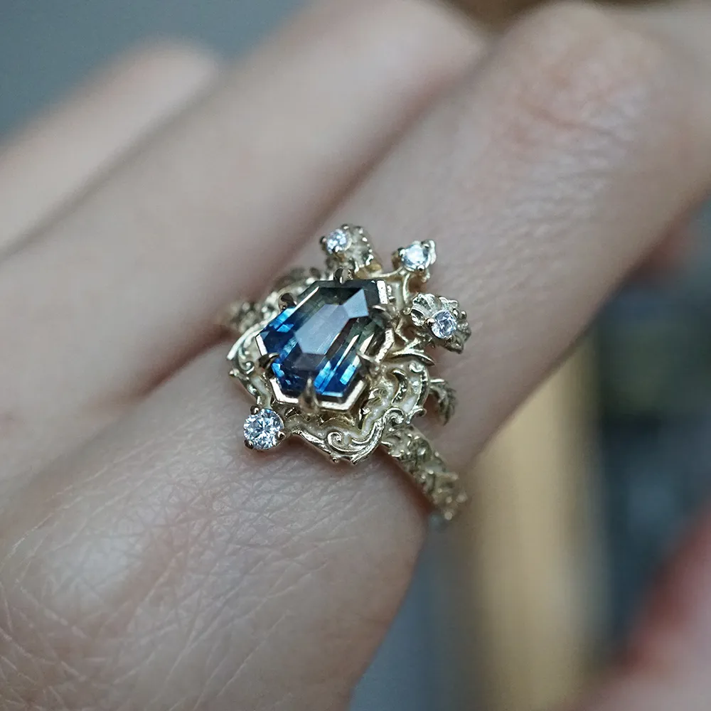 One Of A Kind: Bi Color Sapphire Shield Paradise Ring in 14K and 18K Gold