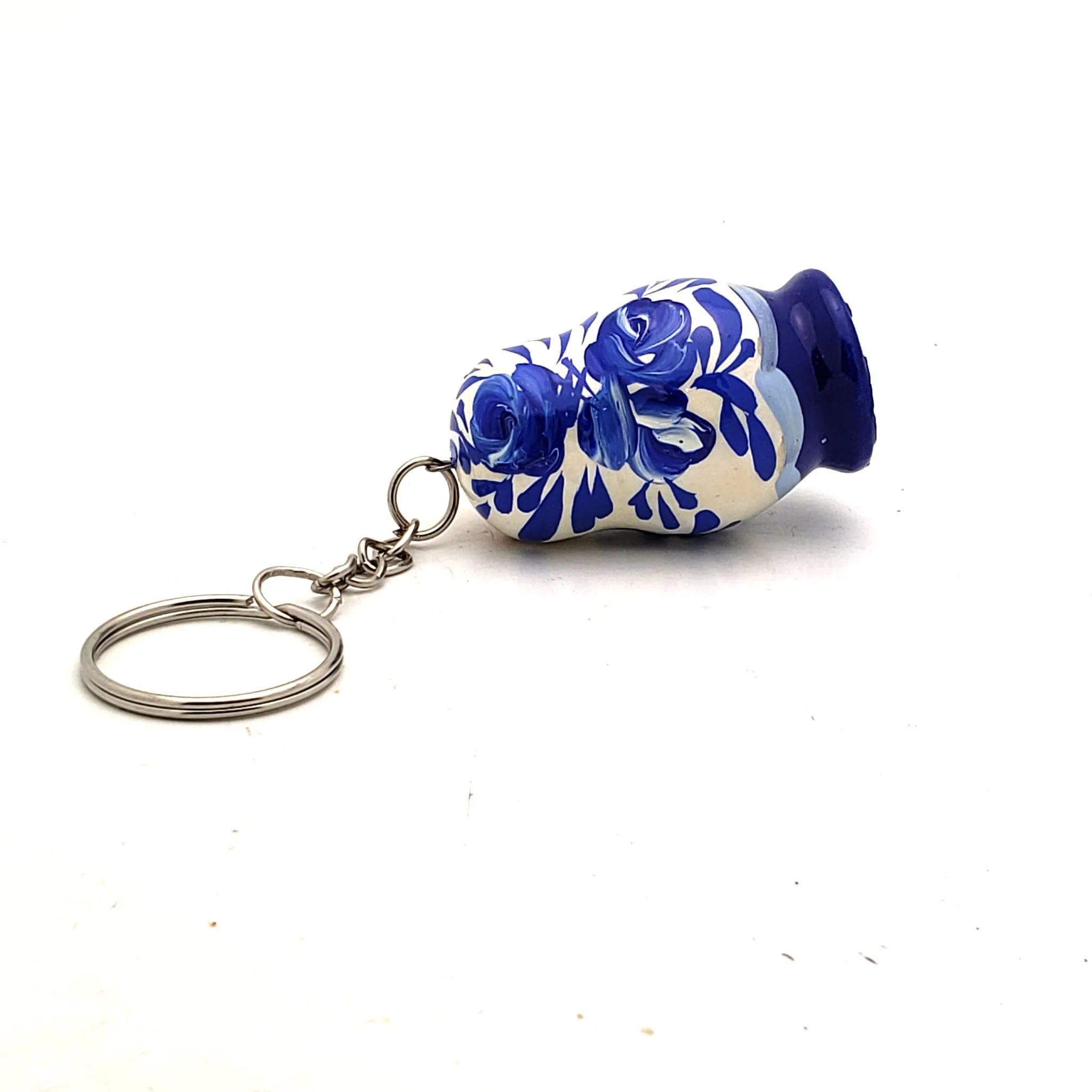 White Matryoshka Doll Keychain with Blue Flowers